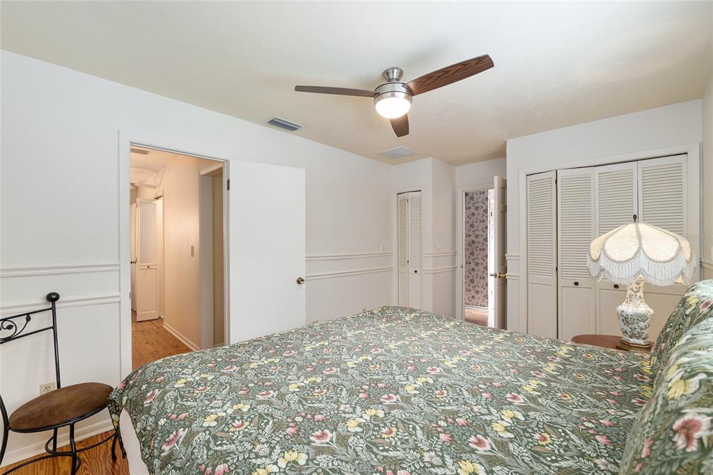 11427 Southwest 10th Terrace Micanopy, FL 32667 - Photo 47 of 77 a bedroom with a bed and a window