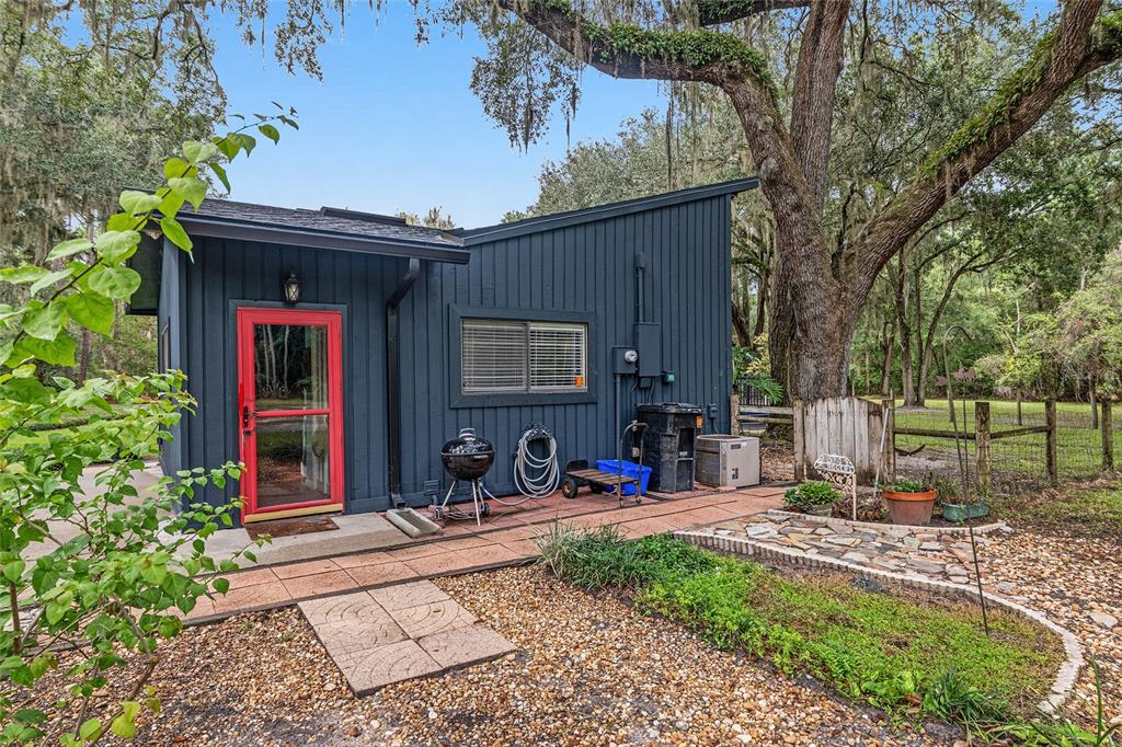 11427 Southwest 10th Terrace Micanopy, FL 32667 - Photo 71 of 77 a view of house with outdoor space and sitting area