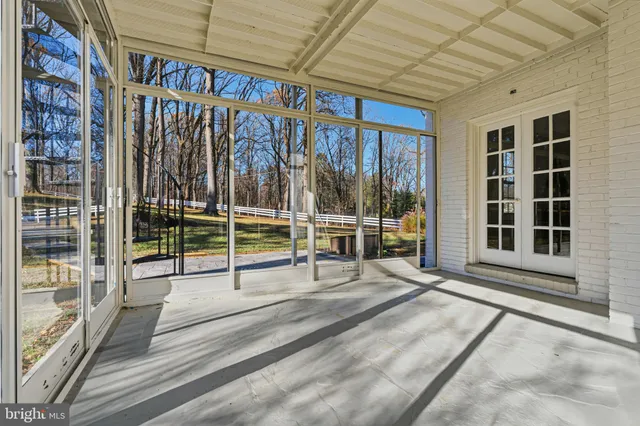 a kitchen with stainless steel appliances a refrigerator sink and microwave