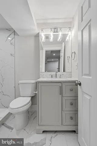 a view of swimming pool with seating area