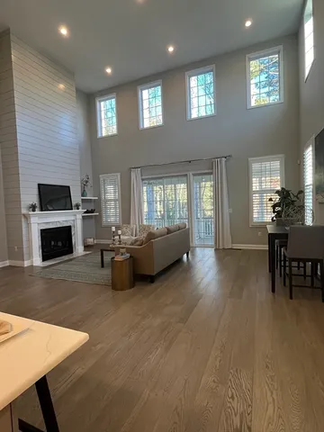 a bathroom with shower sink and mirror