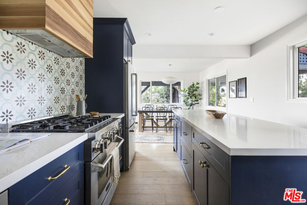 479 Crane Boulevard Los Angeles, CA 90065 - Photo 11 of 35 a kitchen with a stove and a sink