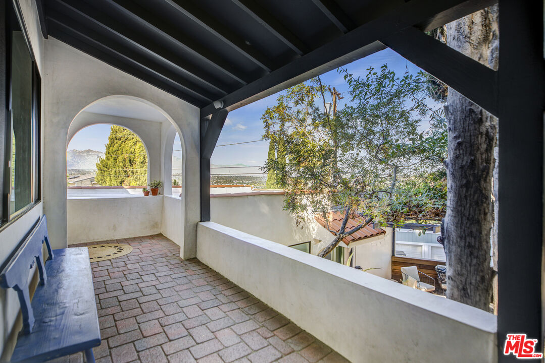 479 Crane Boulevard Los Angeles, CA 90065 - Photo 30 of 35 a view of bathroom with a large window and a bathtub