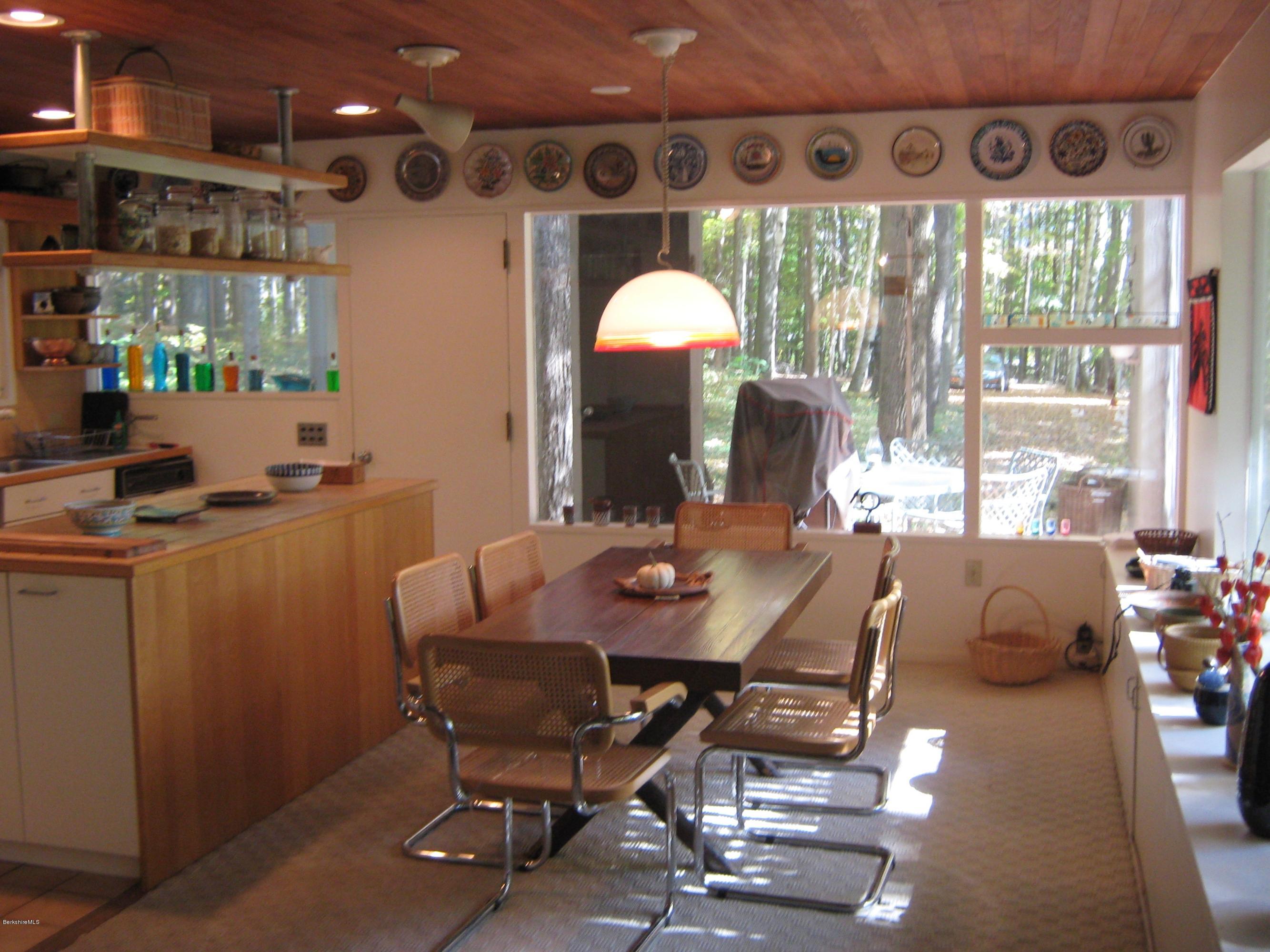 231 Summit Road Richmond, MA 01254 - Photo 30 of 69 a view of a workspace with furniture and a window