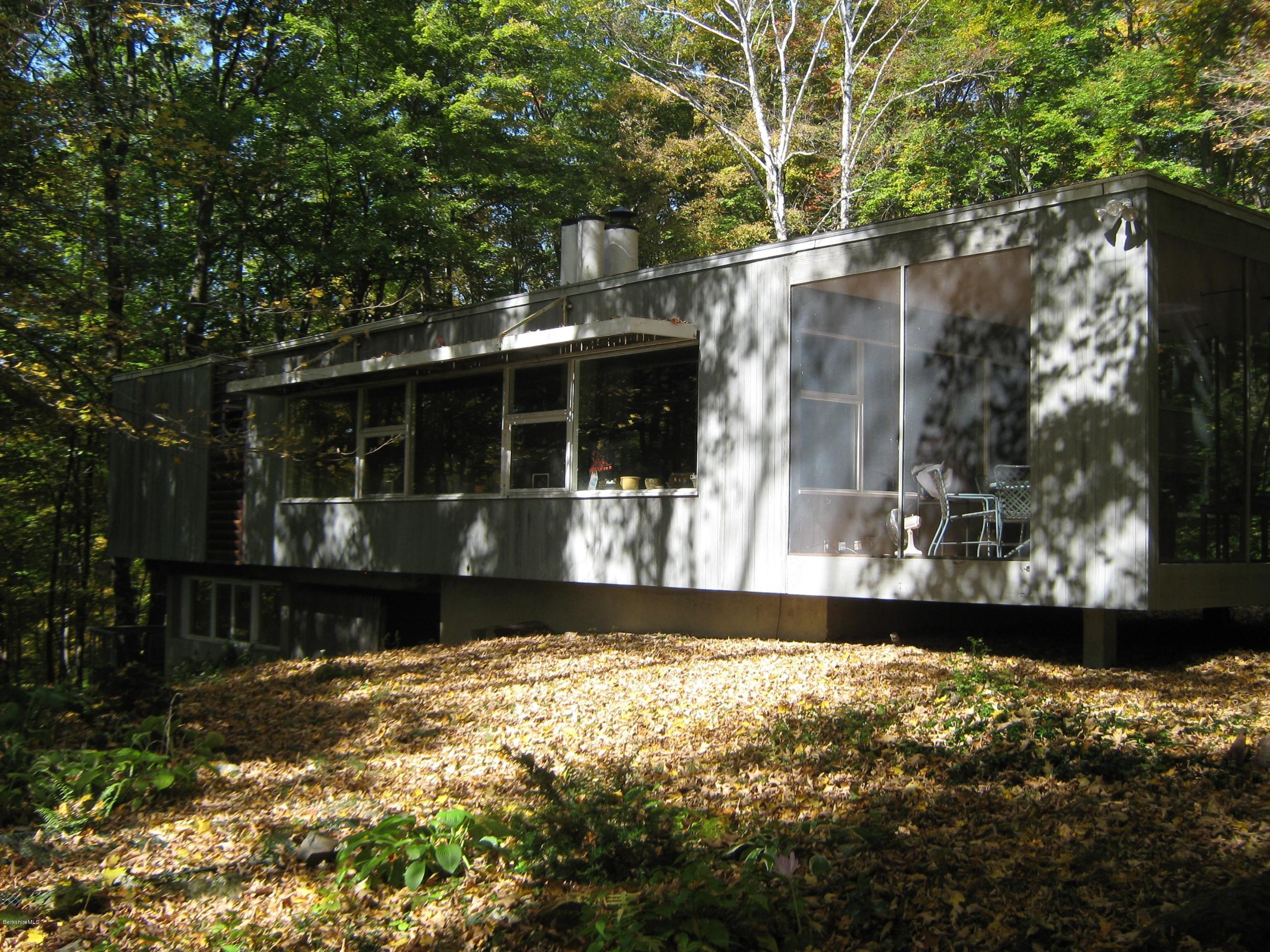 231 Summit Road Richmond, MA 01254 - Photo 4 of 69 a front view of a house with a yard
