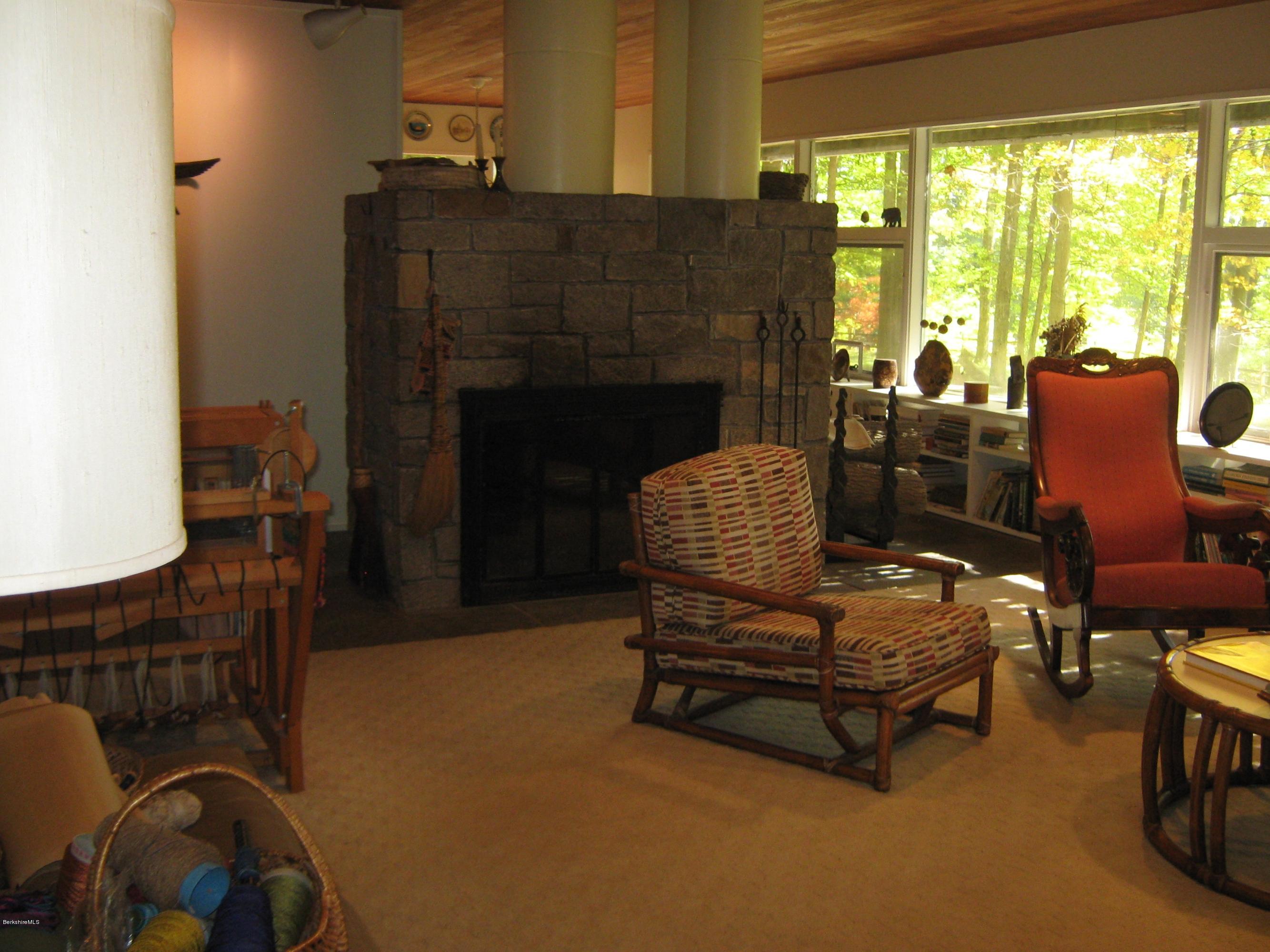 231 Summit Road Richmond, MA 01254 - Photo 34 of 69 a living room with furniture and a fireplace
