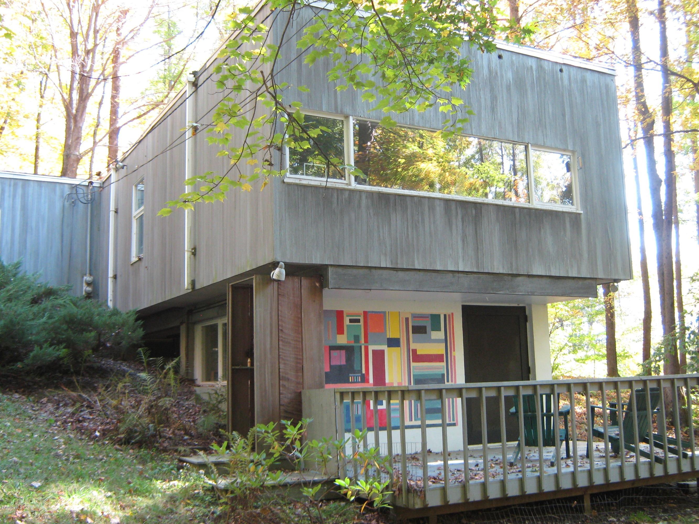 231 Summit Road Richmond, MA 01254 - Photo 9 of 69 a front view of house along with deck and outdoor seating