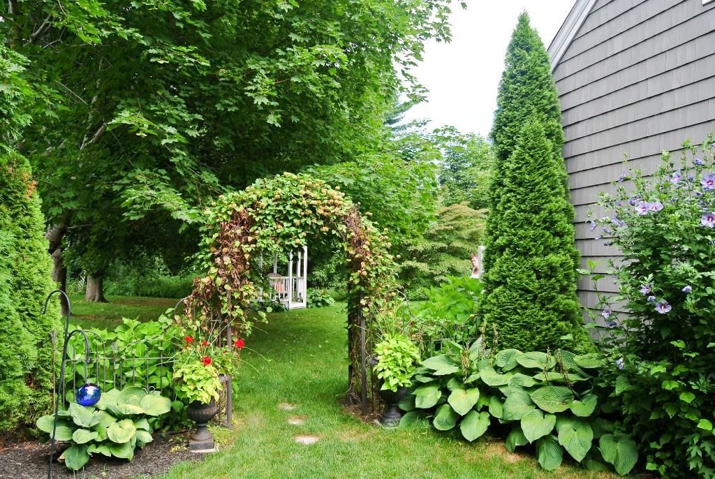 6 Stone Street Saco, ME 04072 - Photo 3 of 35 Entrance to yard from left side of home