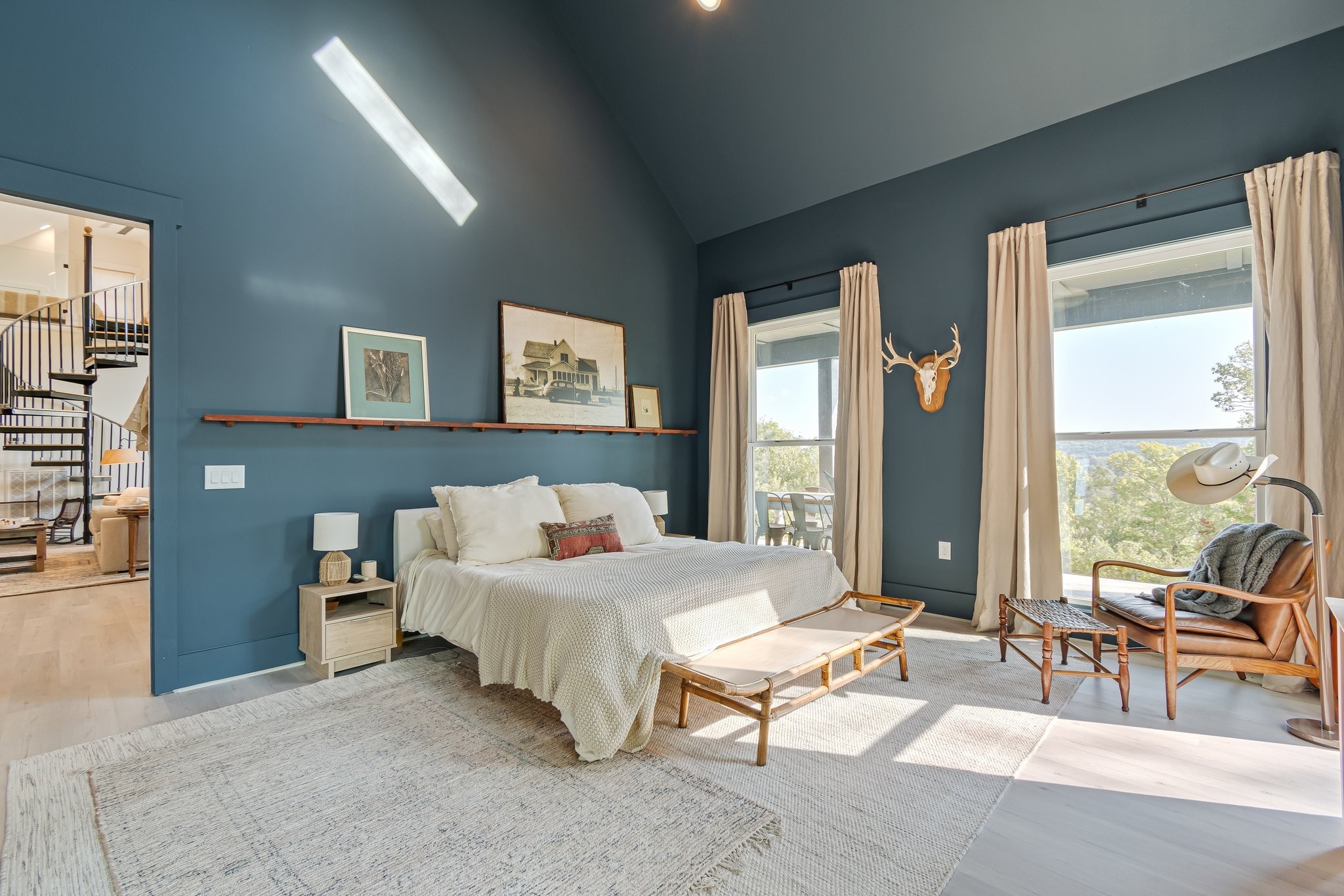 8740 Howell Road Mount Pleasant, TN 38474 - Photo 11 of 70 a bedroom with a bed and large windows