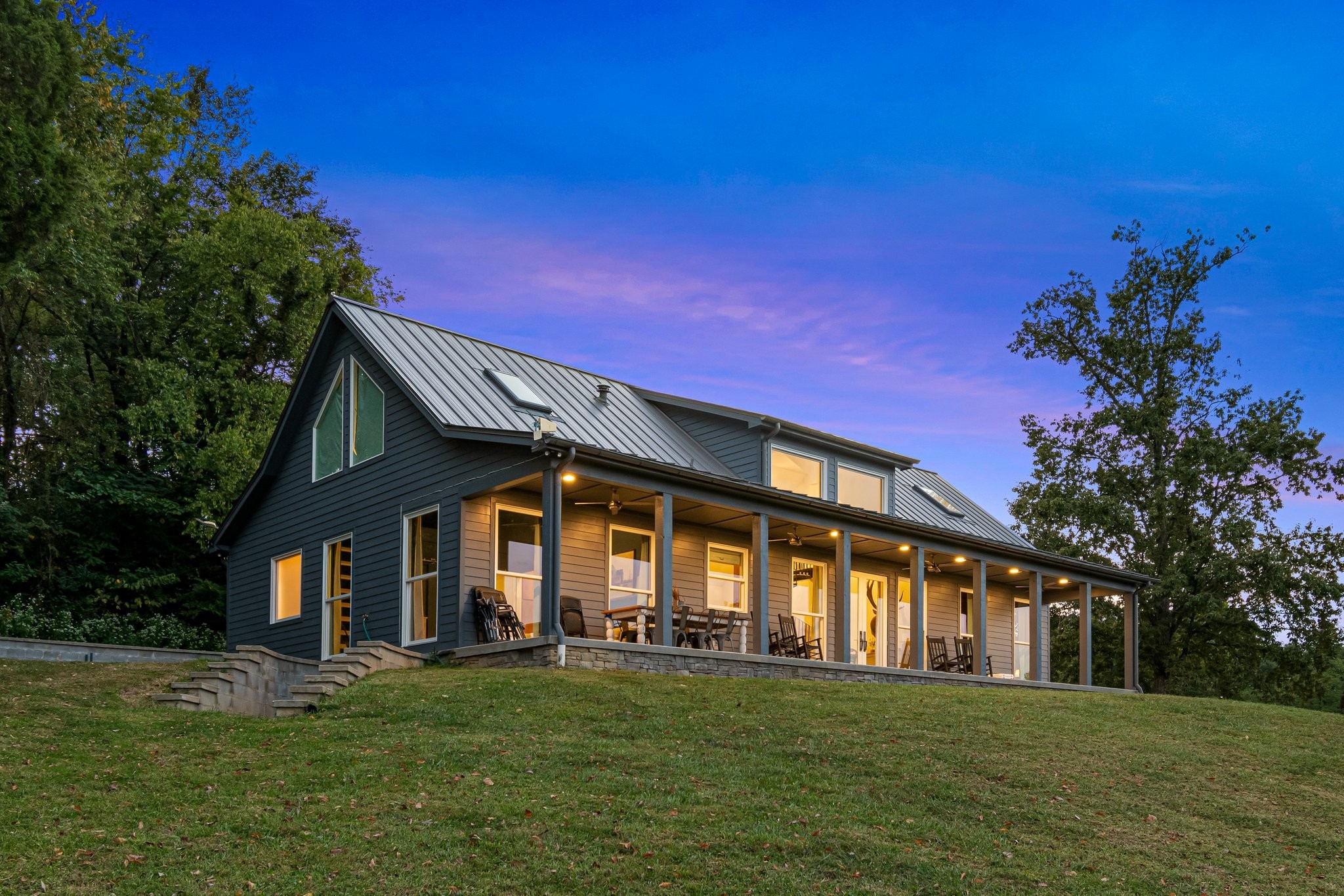 8740 Howell Road Mount Pleasant, TN 38474 - Photo 13 of 70 a view of house with a big yard