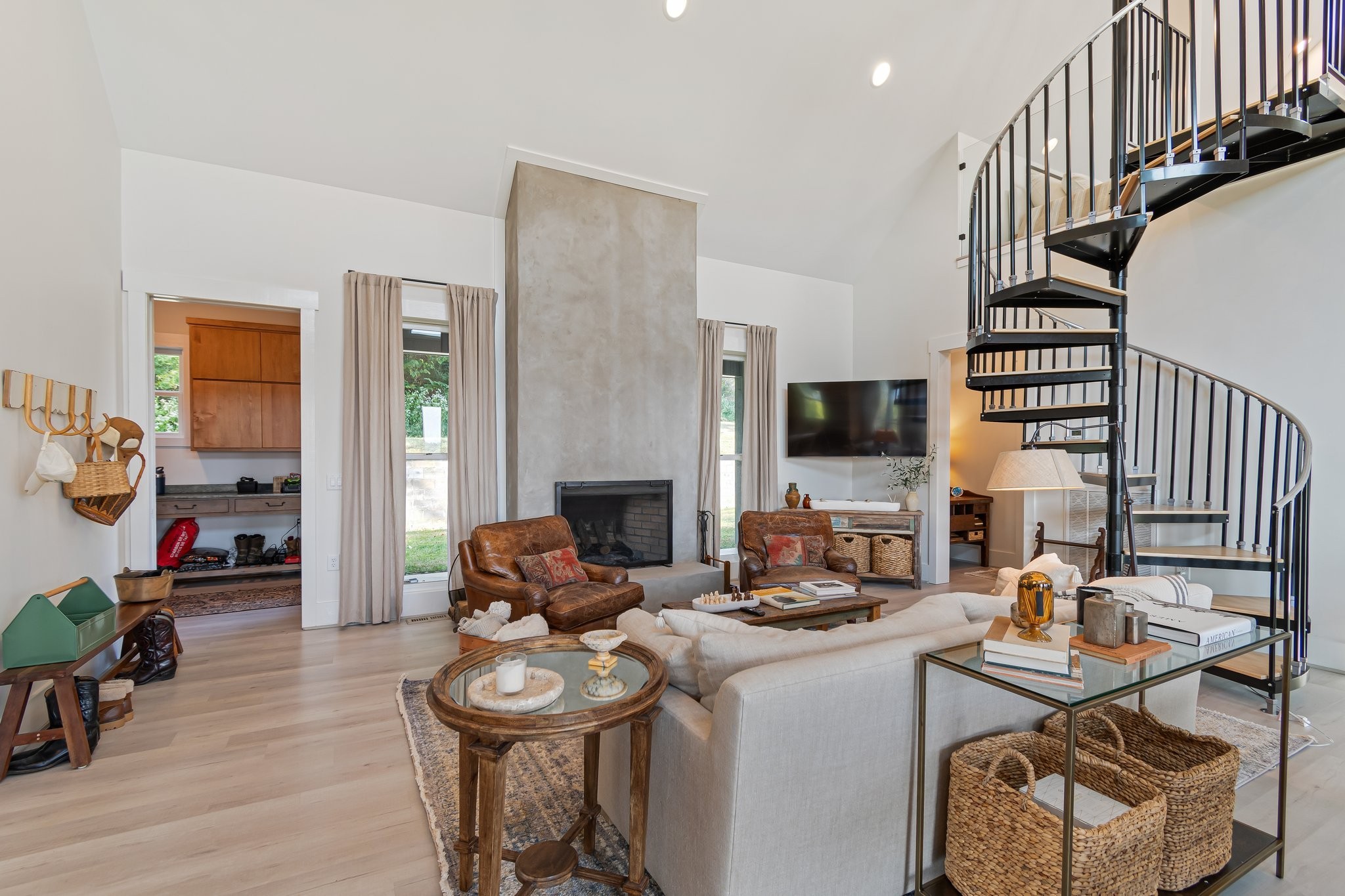 8740 Howell Road Mount Pleasant, TN 38474 - Photo 17 of 70 a living room with furniture and a flat screen tv