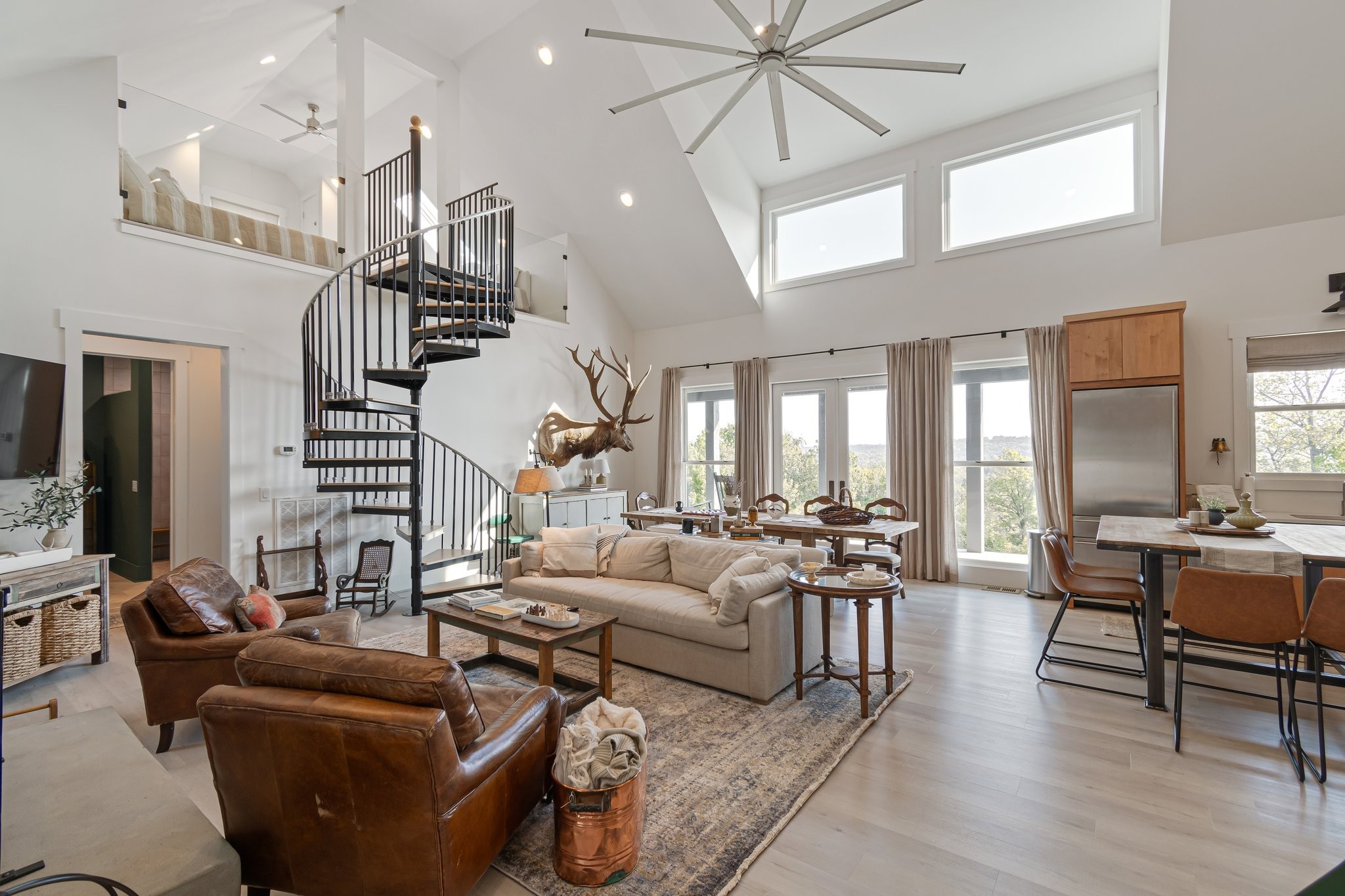 8740 Howell Road Mount Pleasant, TN 38474 - Photo 2 of 70 a living room with furniture and wooden floor