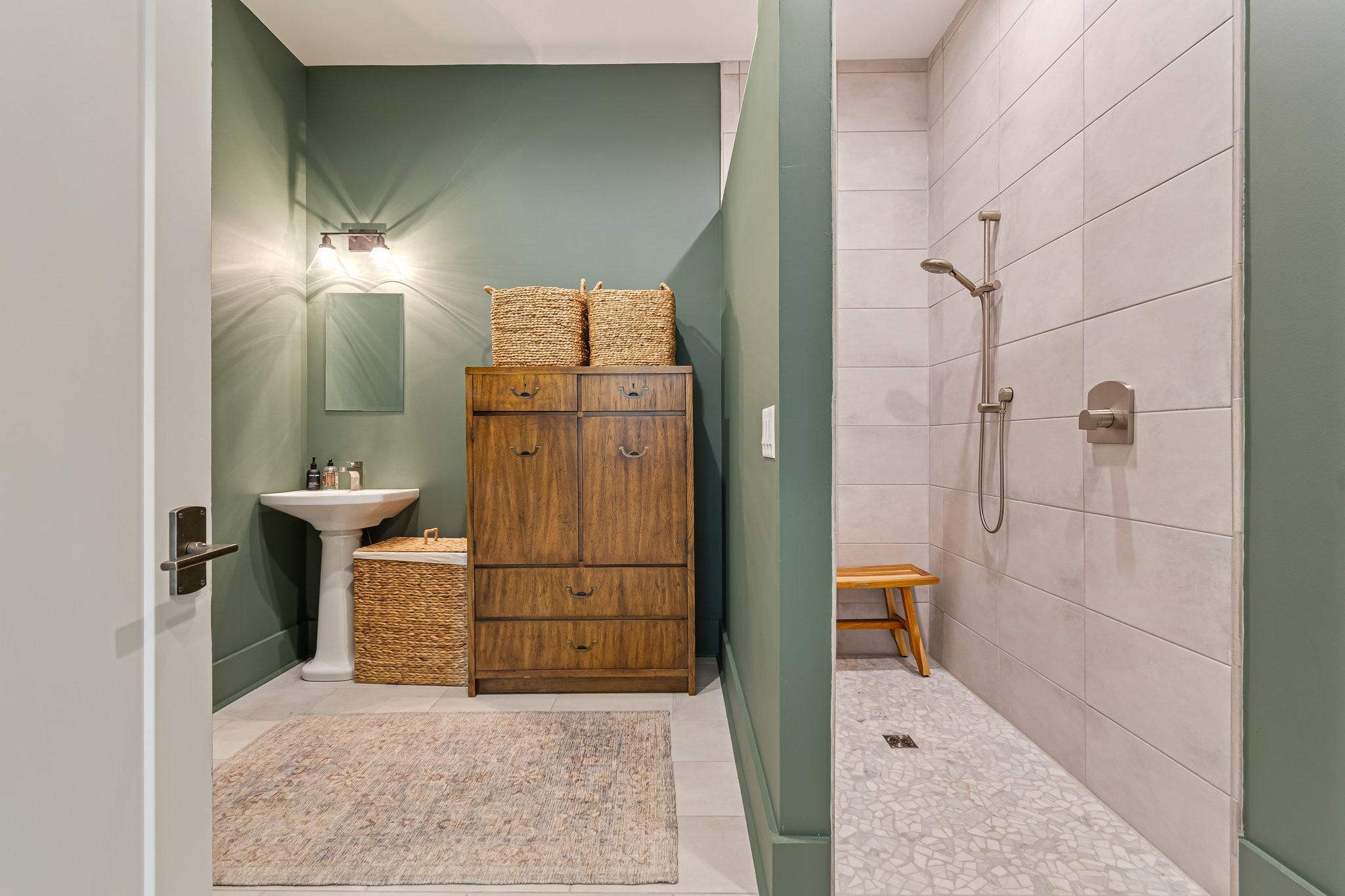 8740 Howell Road Mount Pleasant, TN 38474 - Photo 27 of 70 a bathroom with a sink a toilet and shower