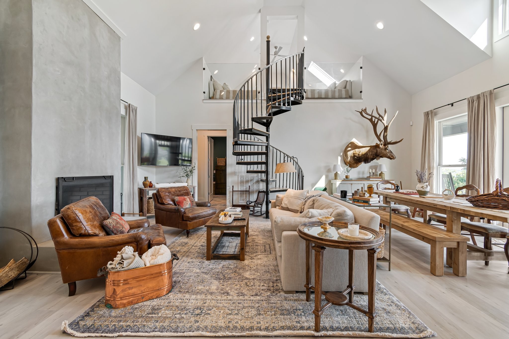 8740 Howell Road Mount Pleasant, TN 38474 - Photo 3 of 70 a living room with furniture kitchen view and a chandelier