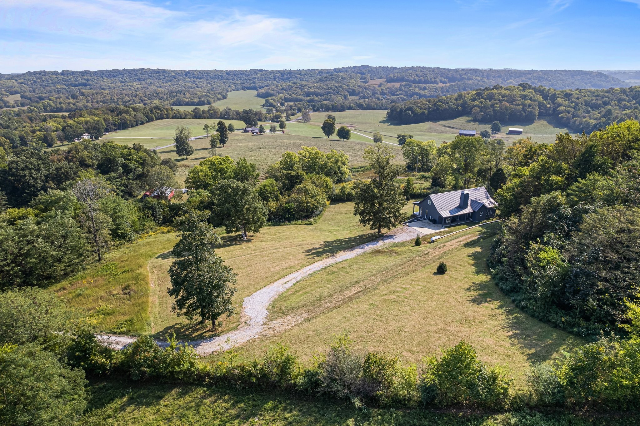8740 Howell Road Mount Pleasant, TN 38474 - Photo 44 of 70 an aerial view of residential house with outdoor space