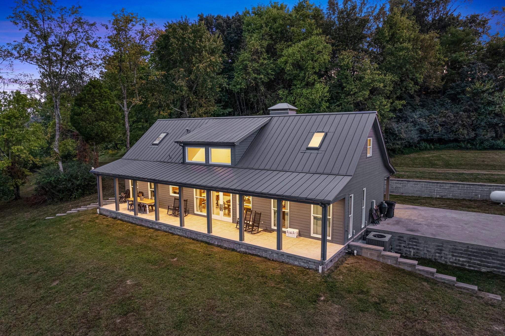 8740 Howell Road Mount Pleasant, TN 38474 - Photo 48 of 70 a view of a house with a yard