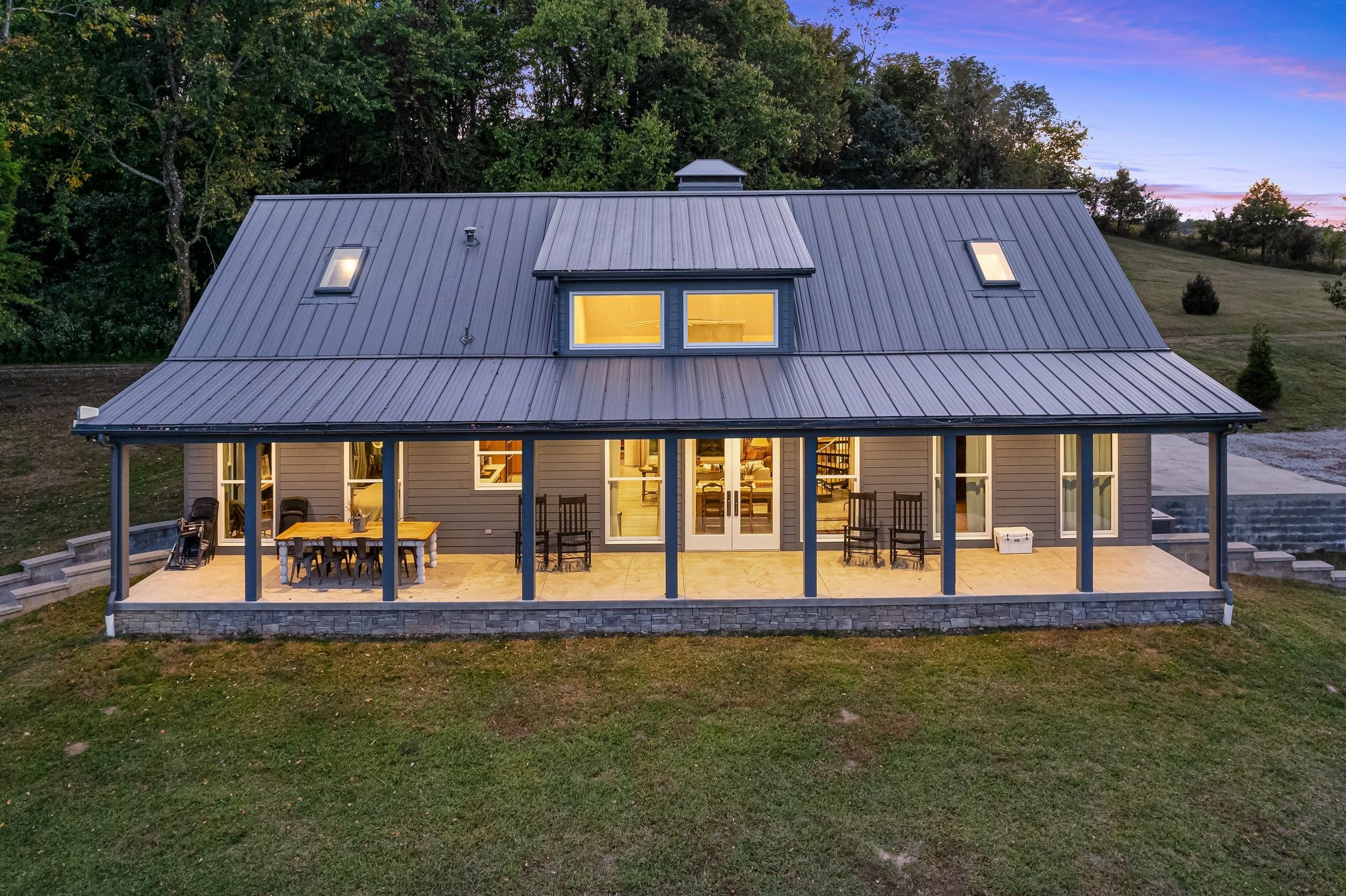 8740 Howell Road Mount Pleasant, TN 38474 - Photo 51 of 70 a view of house with backyard and outdoor seating