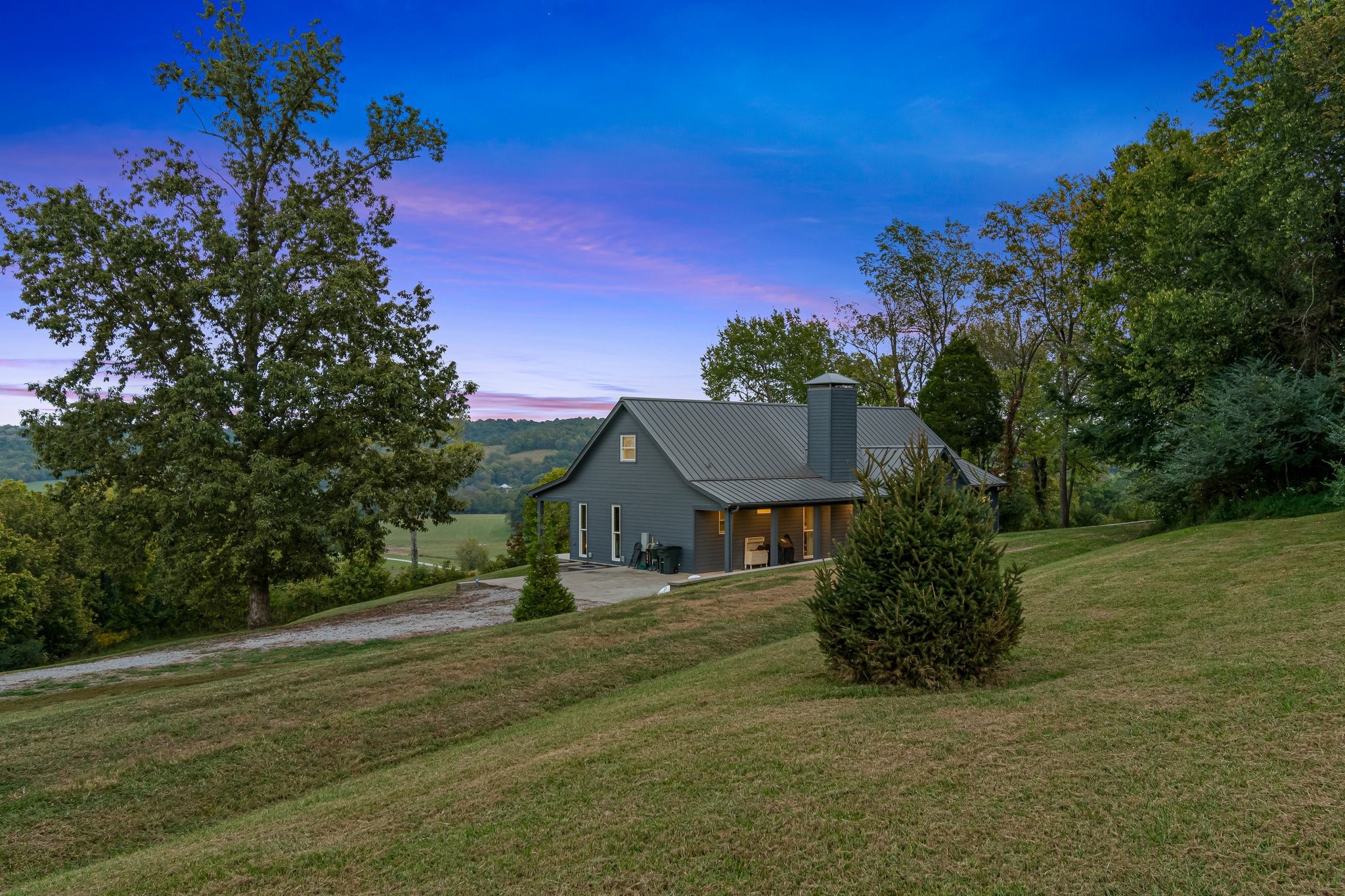 8740 Howell Road Mount Pleasant, TN 38474 - Photo 53 of 70 a view of a house with a yard