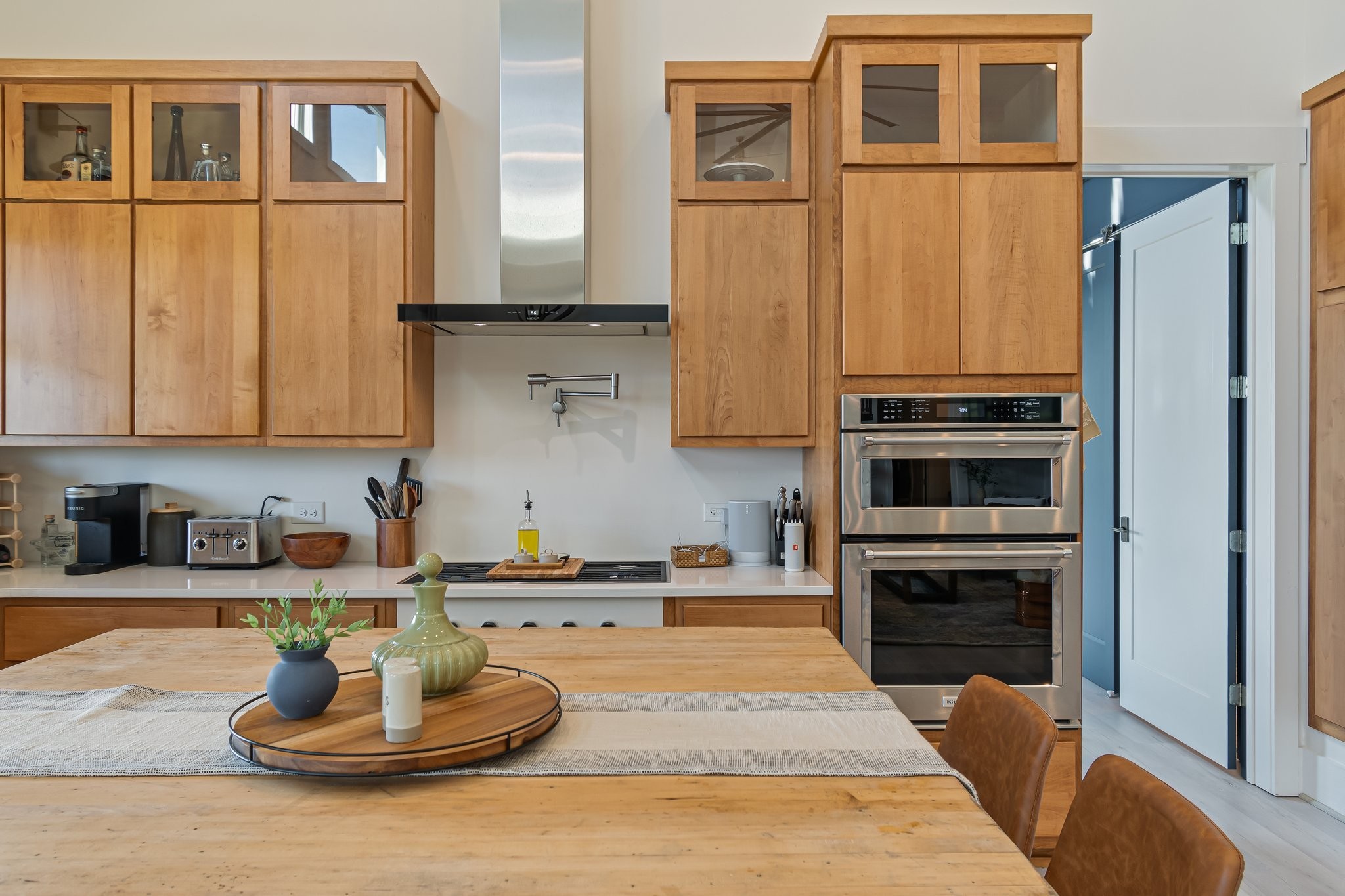 8740 Howell Road Mount Pleasant, TN 38474 - Photo 6 of 70 a kitchen with stainless steel appliances granite countertop a stove top oven a sink and a refrigerator