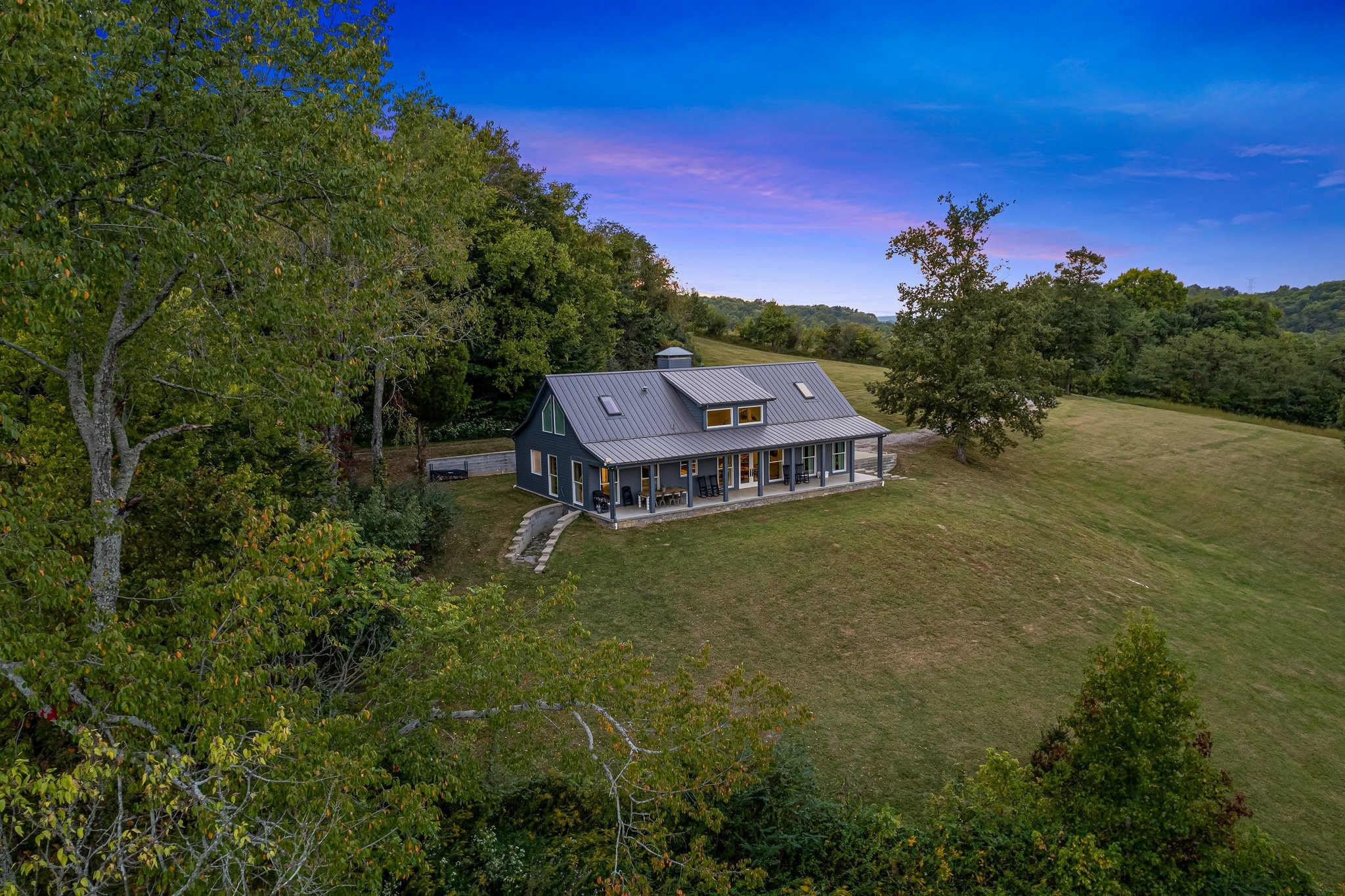 8740 Howell Road Mount Pleasant, TN 38474 - Photo 62 of 70 a aerial view of a house with a yard