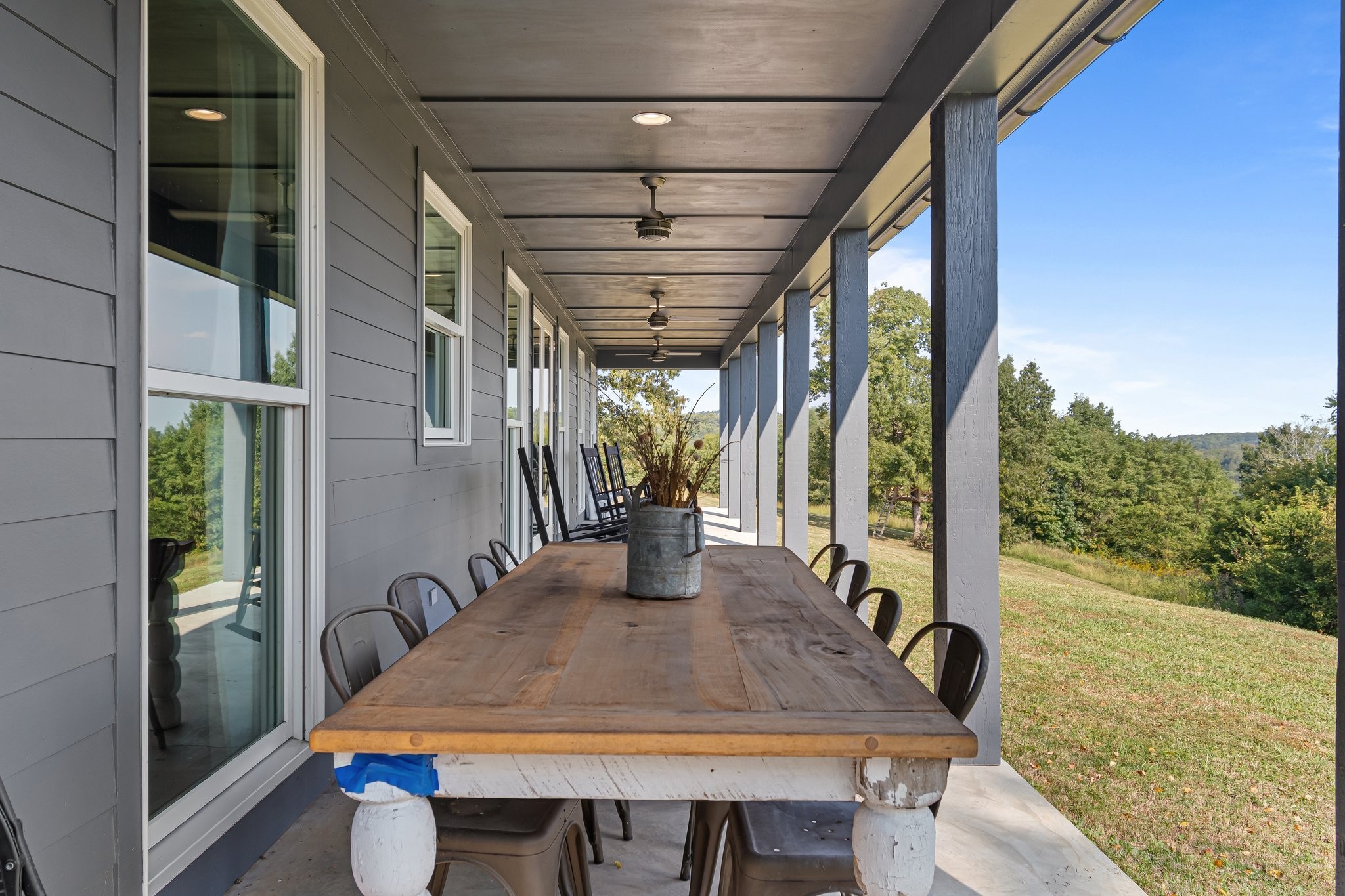 8740 Howell Road Mount Pleasant, TN 38474 - Photo 65 of 70 a view of an outdoor dining space with furniture