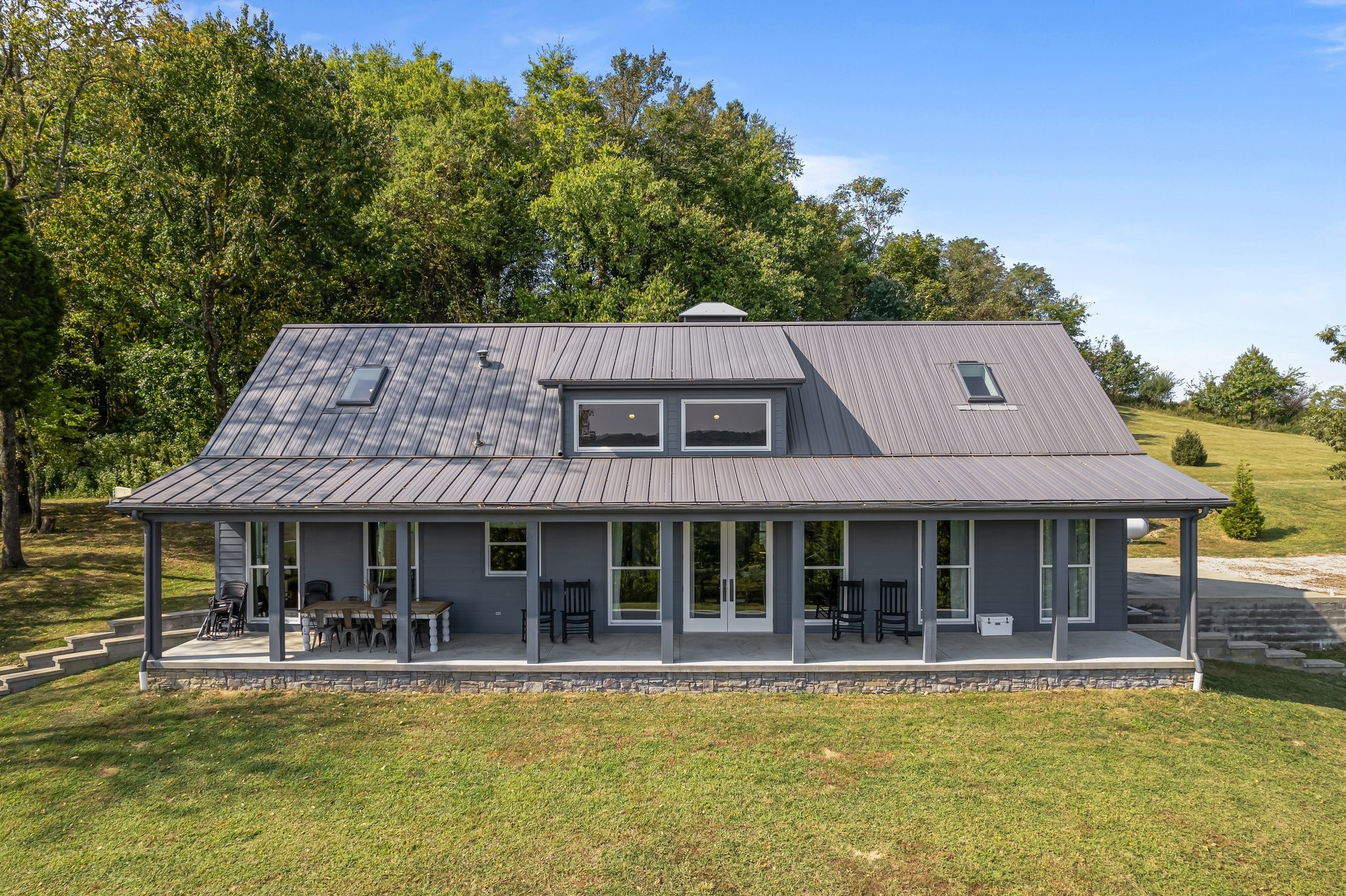 8740 Howell Road Mount Pleasant, TN 38474 - Photo 66 of 70 a view of a house with swimming pool and sitting area