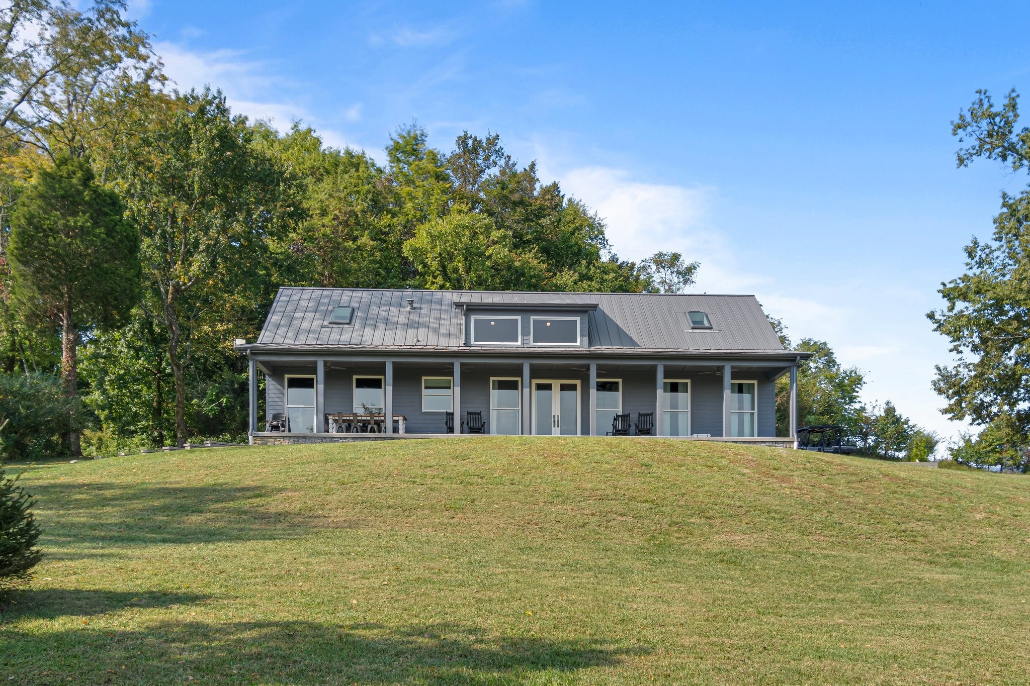 8740 Howell Road Mount Pleasant, TN 38474 - Photo 67 of 70 a view of a house with a garden