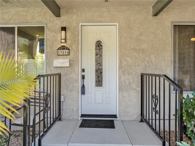a view of a entrance door of the house