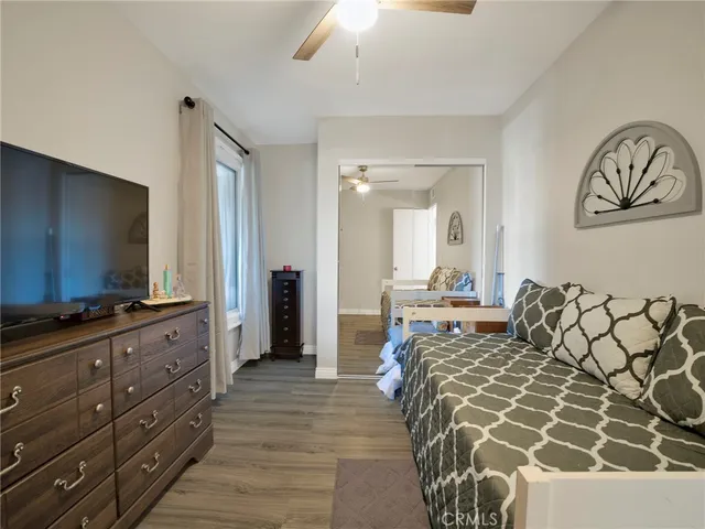 a living room with a couch and a flat screen tv