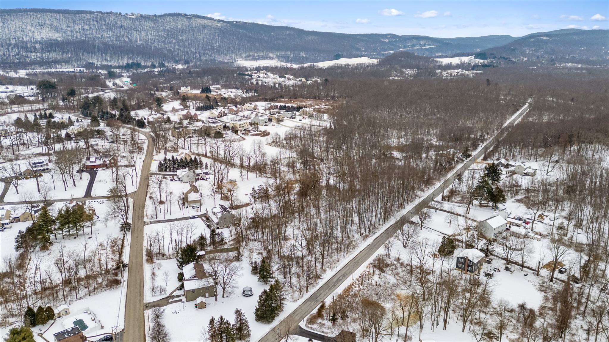 7 Townsend Road Hopewell Junction, NY 12533 - Photo 4 of 7 Snowy aerial view featuring a mountain view