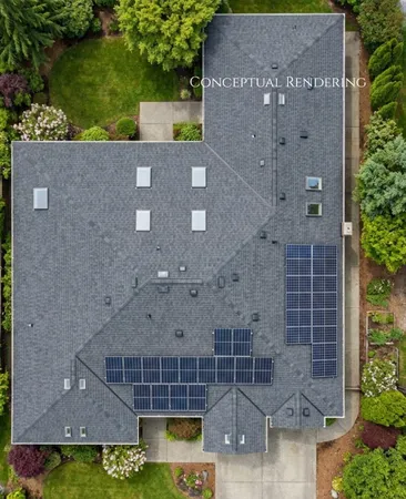 an aerial view of a house with a yard and a fountain