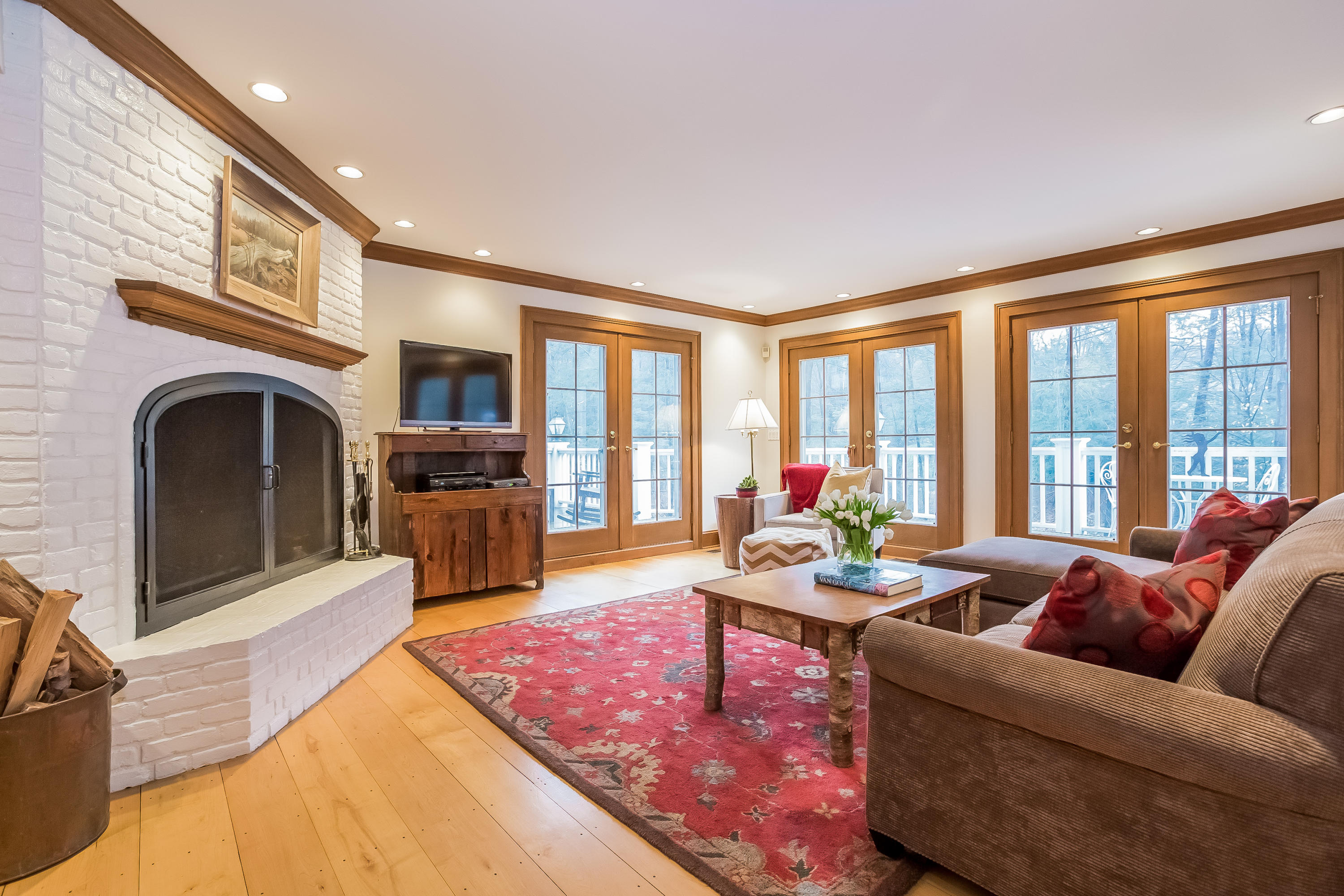 269 Valley Road New Canaan, CT 06840 - Photo 11 of 21 a living room with fireplace furniture and a fireplace
