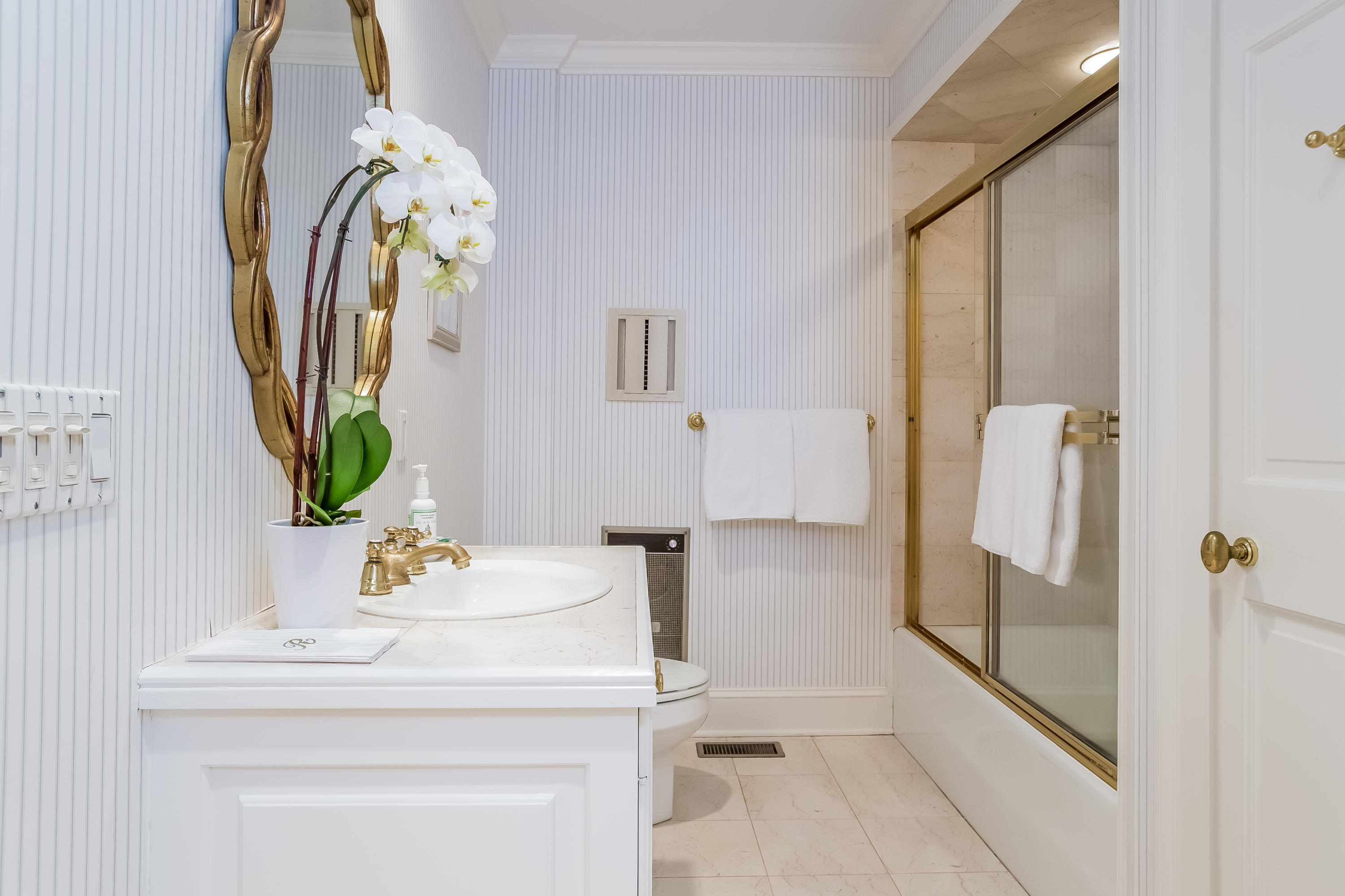 269 Valley Road New Canaan, CT 06840 - Photo 18 of 21 a bathroom with a sink and a mirror