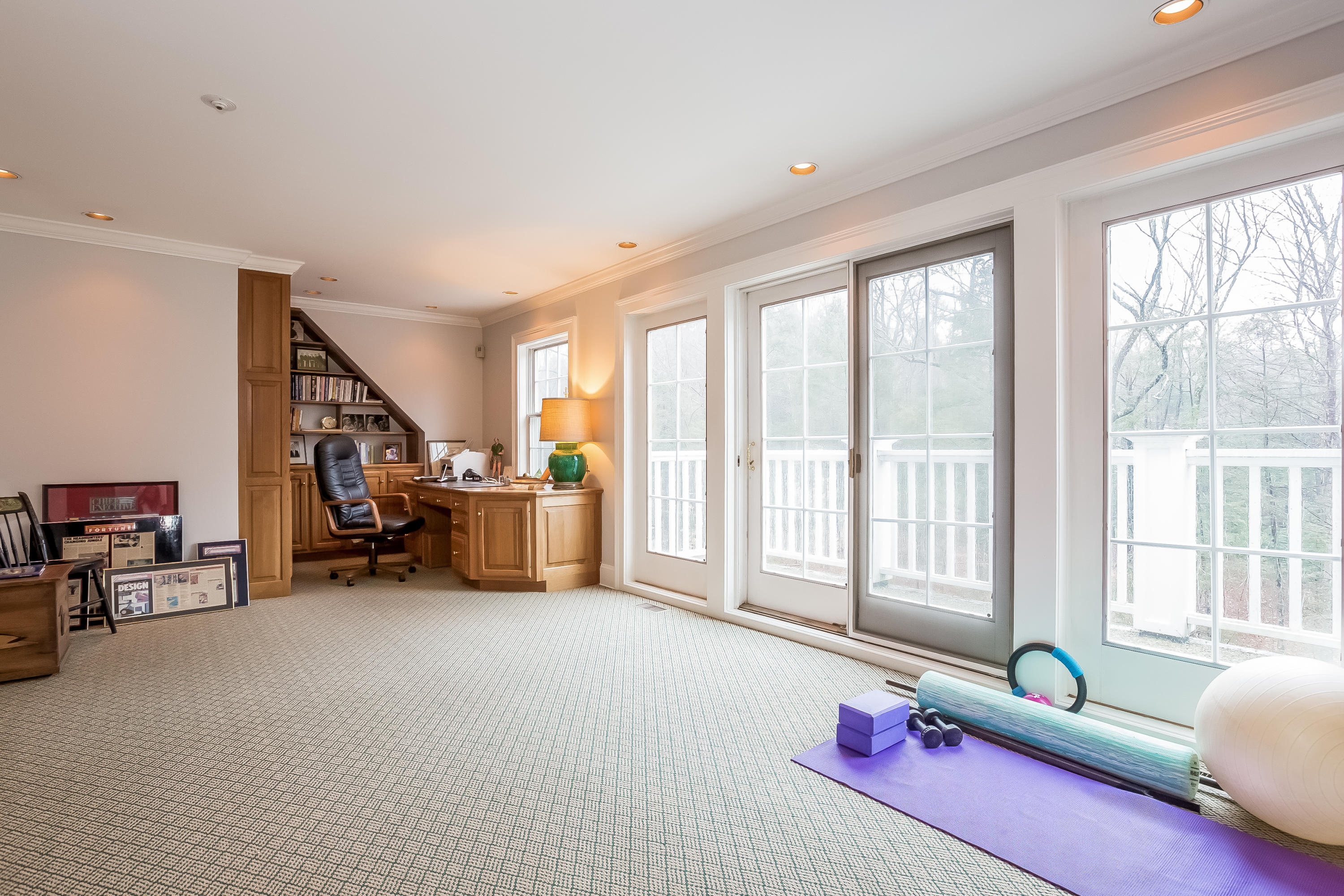 269 Valley Road New Canaan, CT 06840 - Photo 21 of 21 a bedroom with furniture and a large window