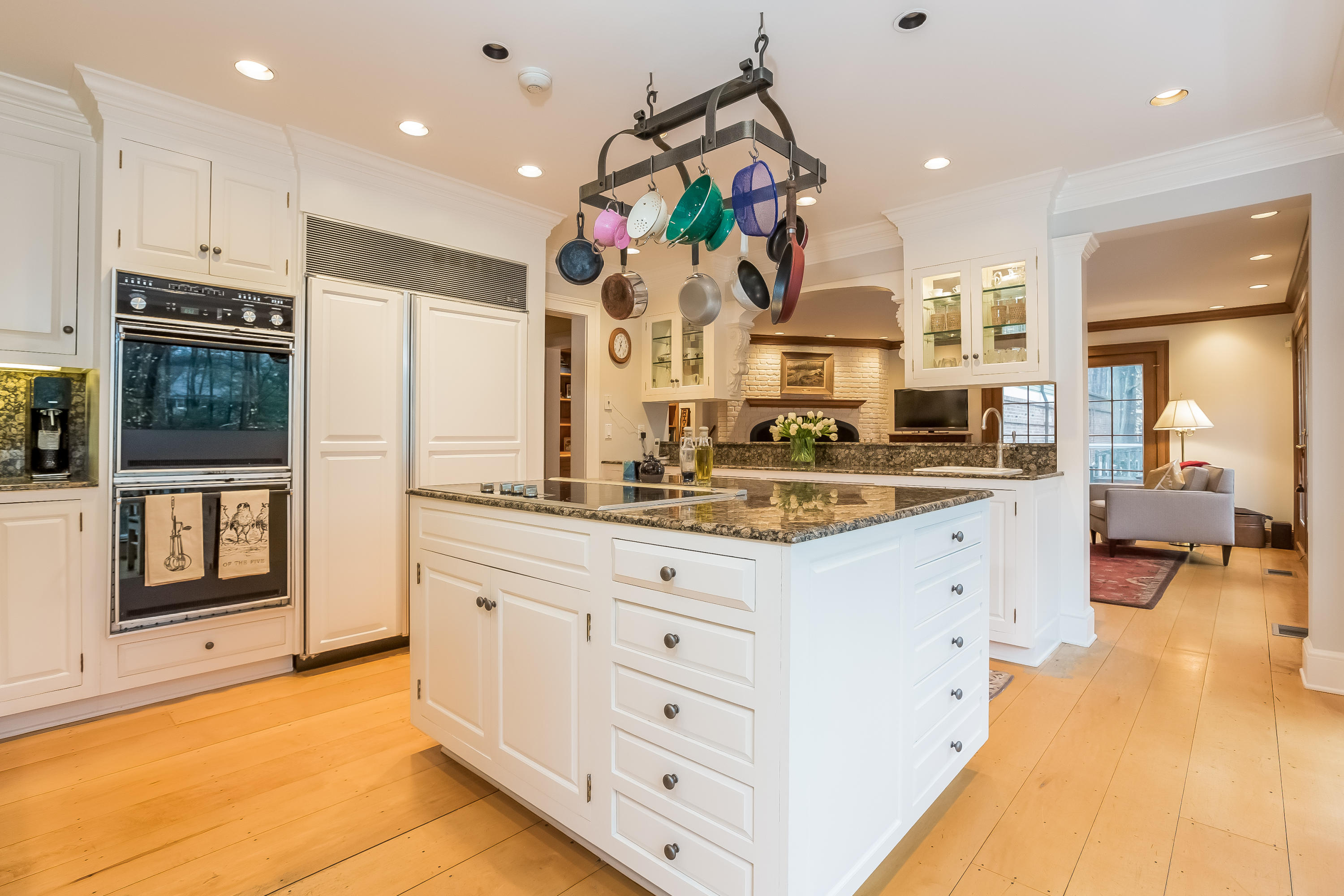 269 Valley Road New Canaan, CT 06840 - Photo 8 of 21 a large kitchen with granite countertop a lot of counter space