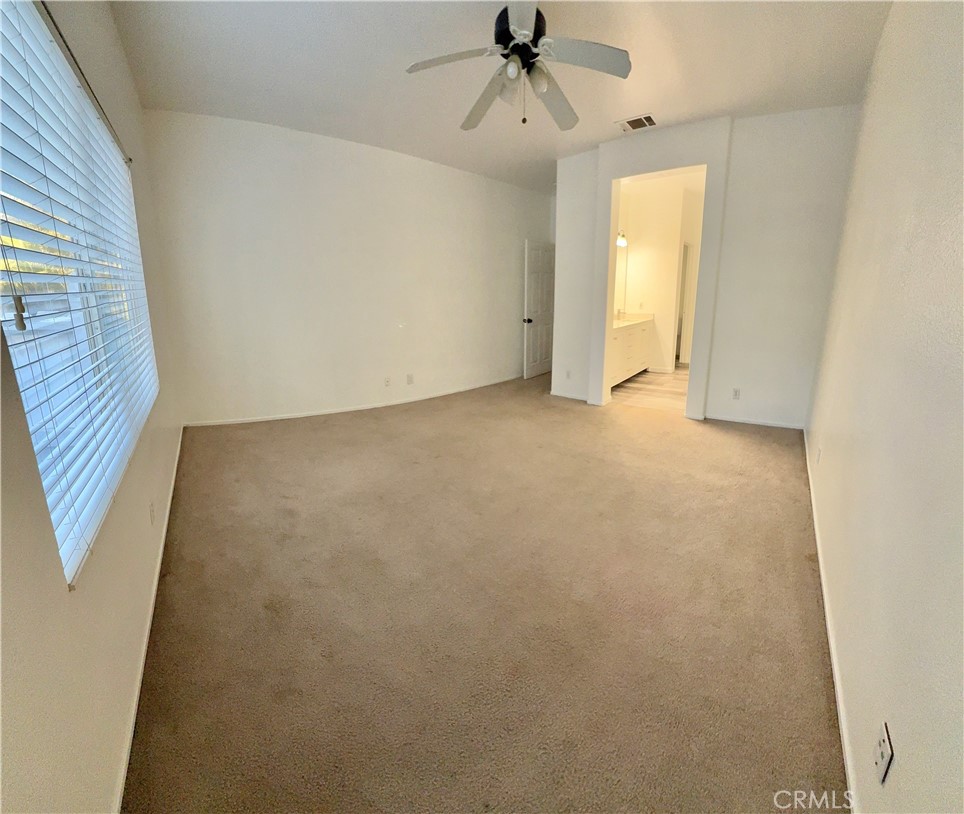1335 Torrey Pines Court Atwater, CA 95301 - Photo 18 of 28 a view of an empty room with a window