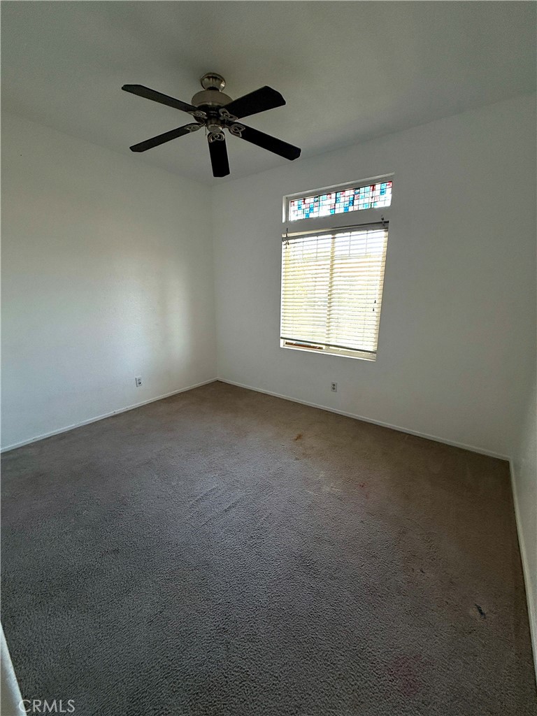 1335 Torrey Pines Court Atwater, CA 95301 - Photo 21 of 28 an empty room with a window