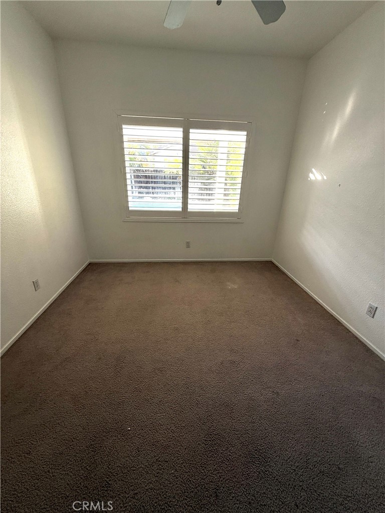 1335 Torrey Pines Court Atwater, CA 95301 - Photo 22 of 28 an empty room with a window