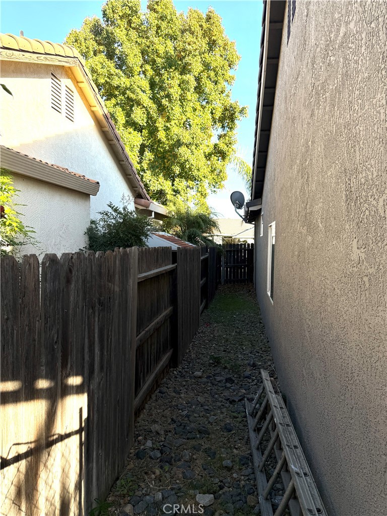 1335 Torrey Pines Court Atwater, CA 95301 - Photo 28 of 28 a view of backyard with wooden fence