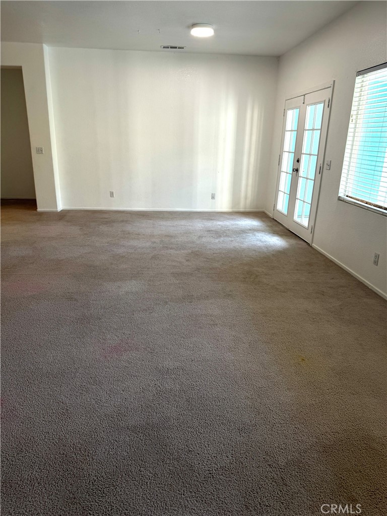 1335 Torrey Pines Court Atwater, CA 95301 - Photo 5 of 28 a view of an empty room with a window