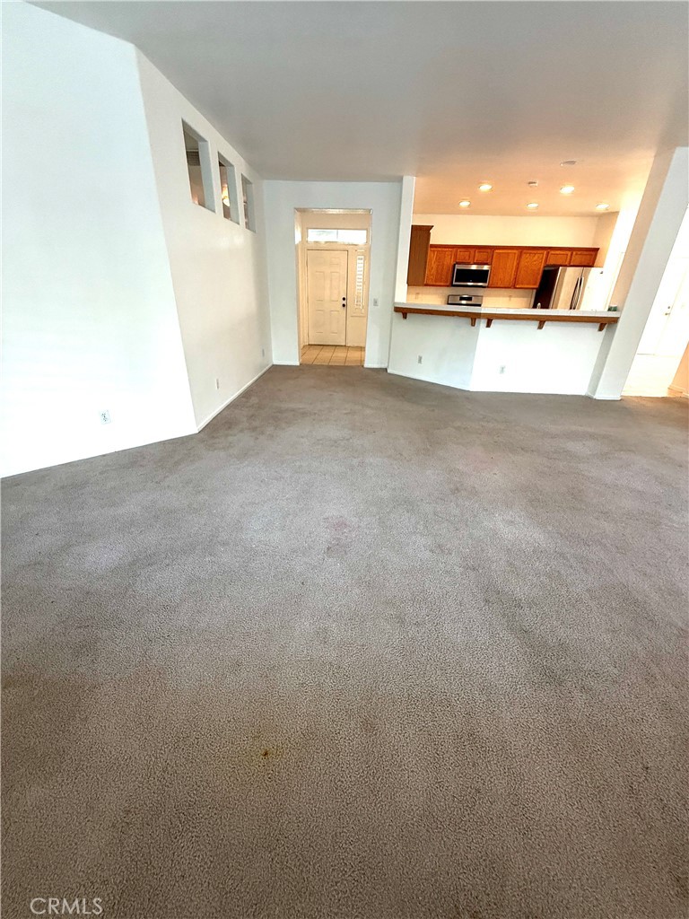 1335 Torrey Pines Court Atwater, CA 95301 - Photo 7 of 28 a view of a kitchen with a sink and a window
