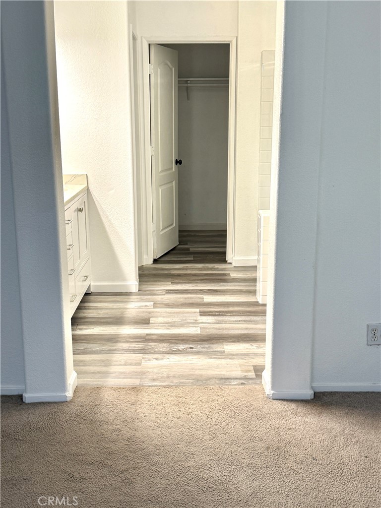 1335 Torrey Pines Court Atwater, CA 95301 - Photo 8 of 28 a view of empty room with wooden floor