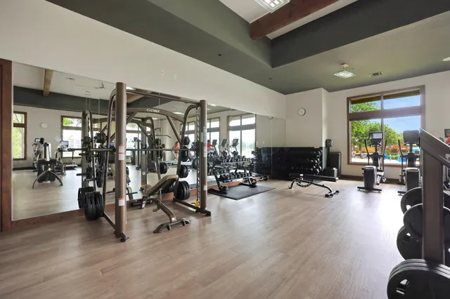 a view of a room with gym equipment