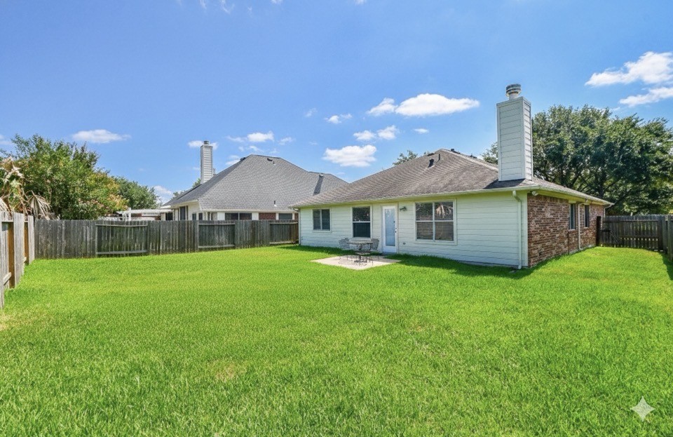 8515 Split Branch Lane Houston, TX 77095 - Photo 31 of 31 a front view of a house with garden