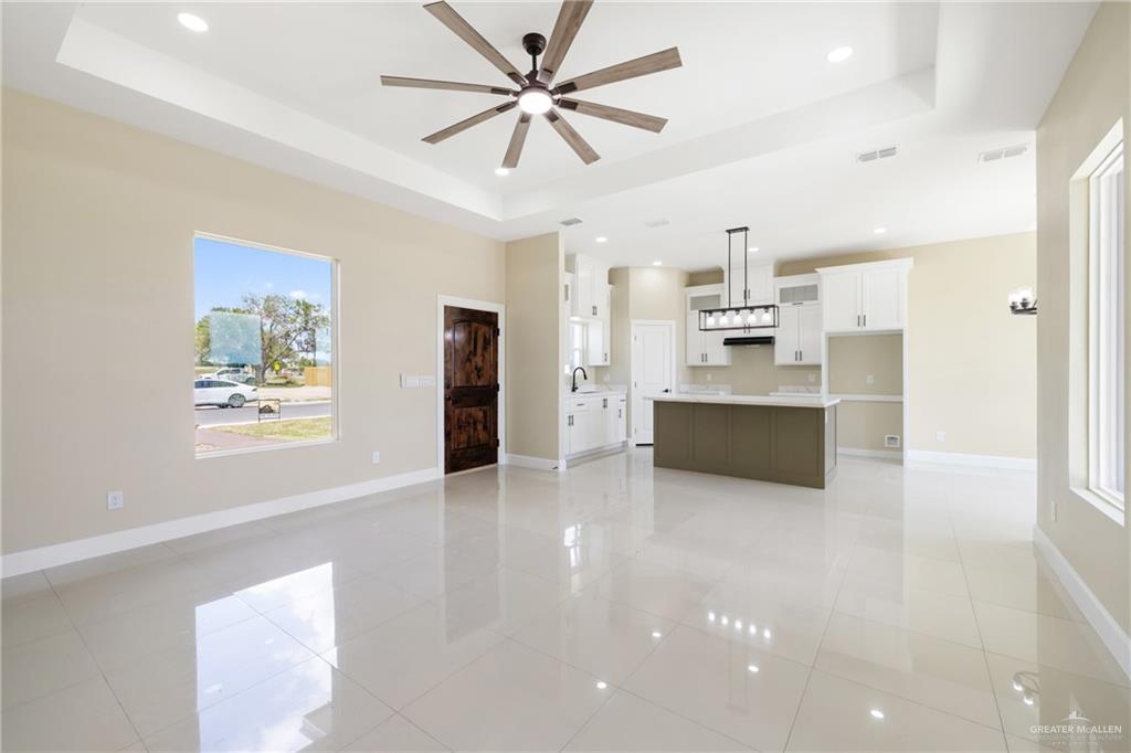 105 Lenon Street Edcouch, TX 78538 - Photo 6 of 19 a view of a kitchen with a sink and a refrigerator