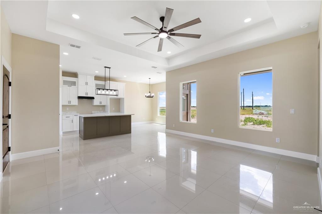 105 Lenon Street Edcouch, TX 78538 - Photo 8 of 19 a view of kitchen with windows and ceiling fan