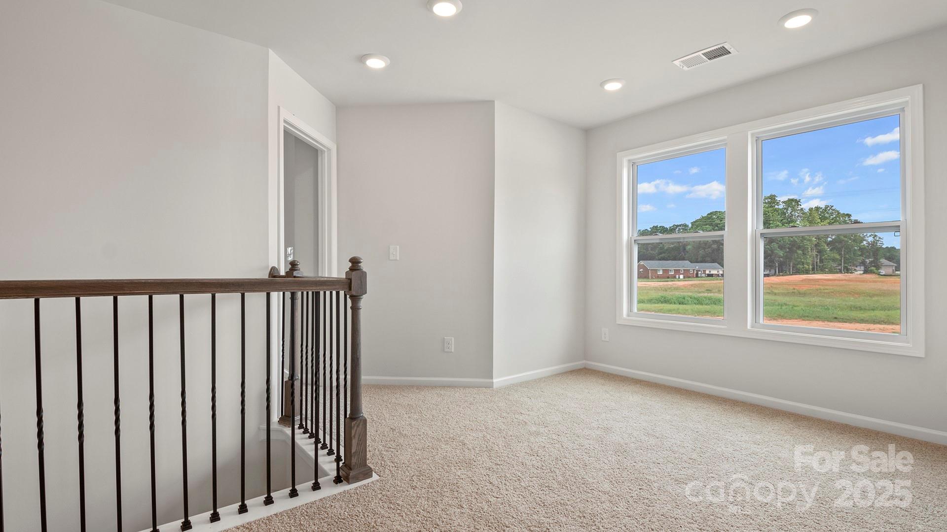 313 Lagoon Road Fletcher, NC 28732 - Photo 17 of 34 a view of an empty room with a window