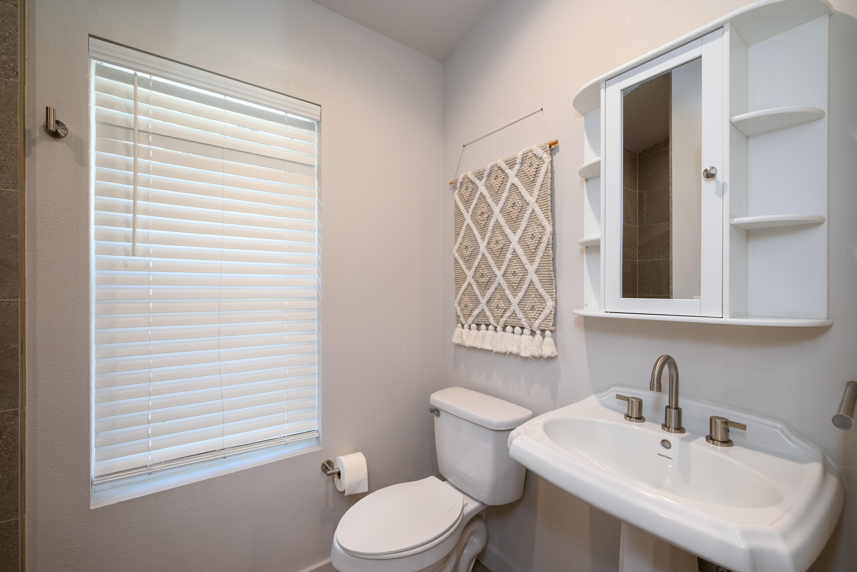 2546 Fisher Road Roseburg, OR 97471 - Photo 45 of 59 a white toilet sitting next to a bathroom sink