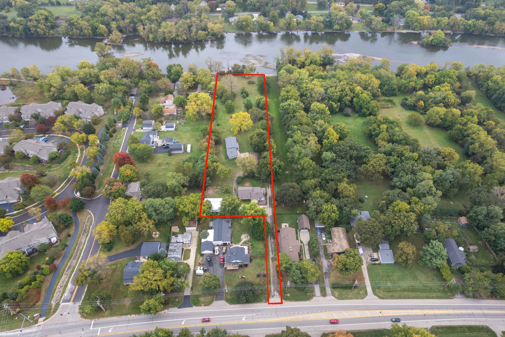 2110-a-b State Route 31 Oswego, IL 60543 - Photo 33 of 55 an aerial view of residential houses with outdoor space and lake view