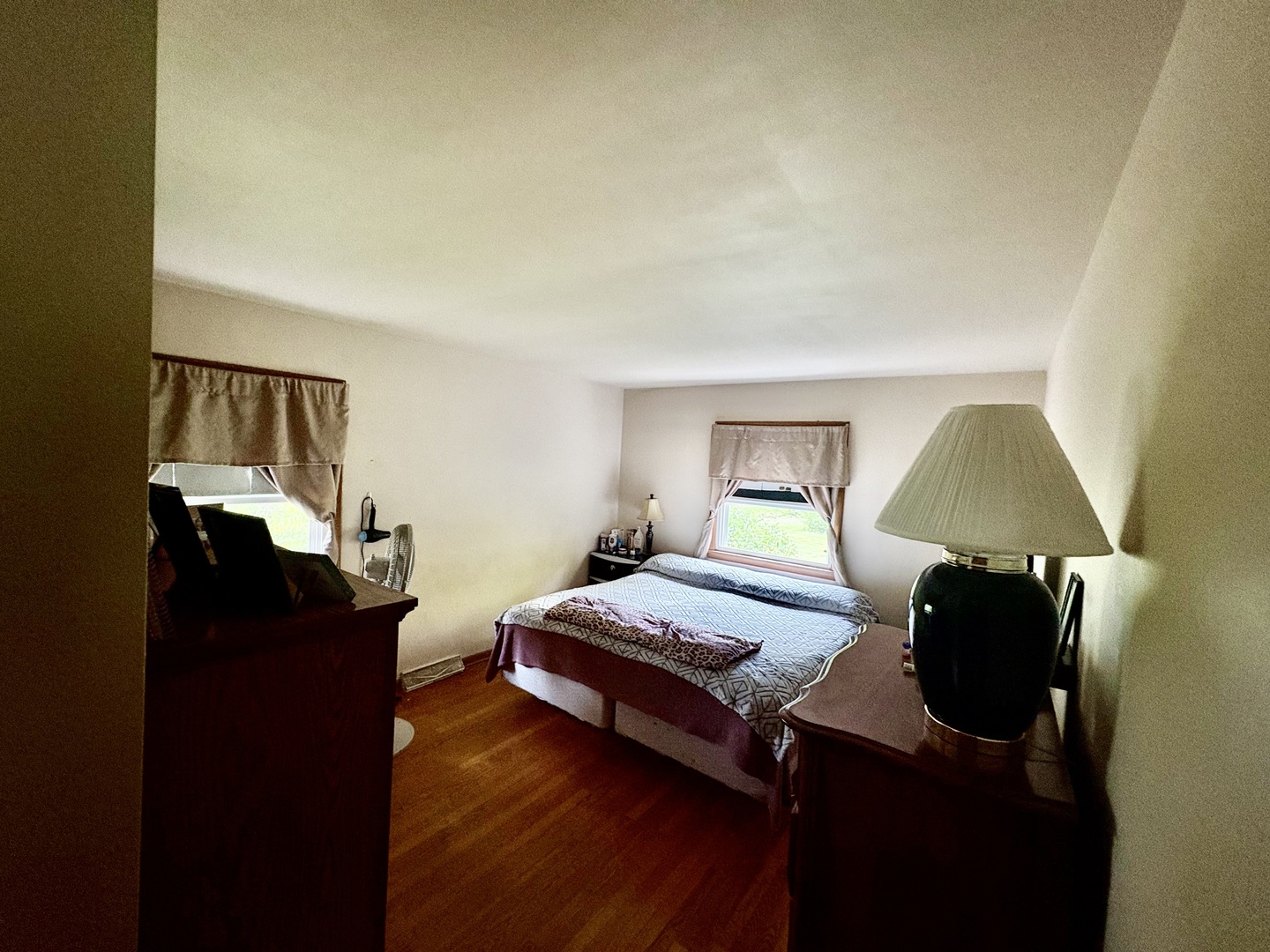 2110-a-b State Route 31 Oswego, IL 60543 - Photo 47 of 55 a bedroom with a bed and wooden floor